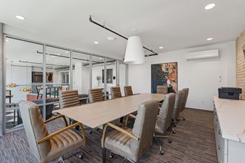 Conference room with brown table and chair